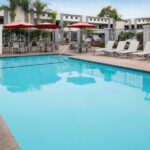 Outdoor Pool, Fitness Center & More: Relaxation at Solara Inn and Suites
